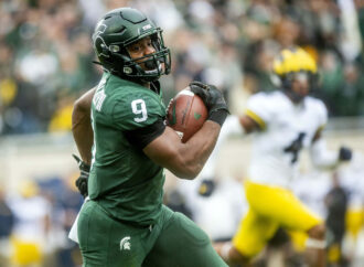 Kenneth Walker III: The Rising NFL Star Making Headlines