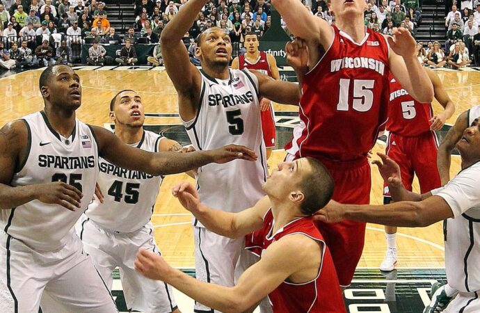 MI State vs Wisconsin: A Battle of College Sports Titans