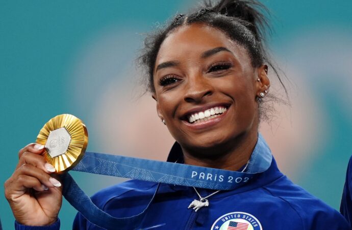 Simone Biles: Redefining Gymnastics and Inspiring Generations