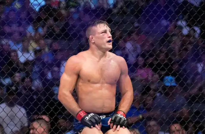 Drew Dober Secures Knockout Victory Over Michael Johnson at UFC 326