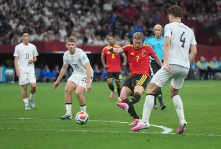 Kevin De Bruyne scores Belgium's third goal.