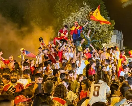 Spain supporters celebrate winning the World Cup in Los Palacios, Seville.